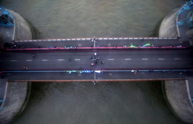 A view from above as the men's wheelchair race passes over Tower Bridge