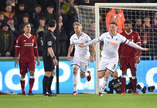 Alfie Mawson celebrates after breaking the deadlock (Simon Galloway/EMPICS)