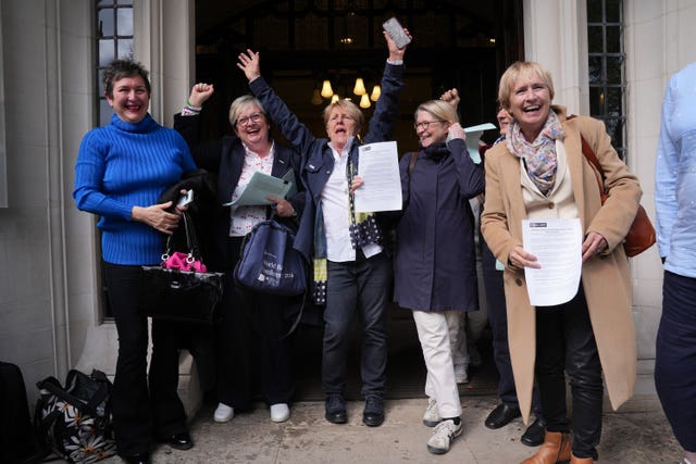 Women celebrating outside UK Supreme Court