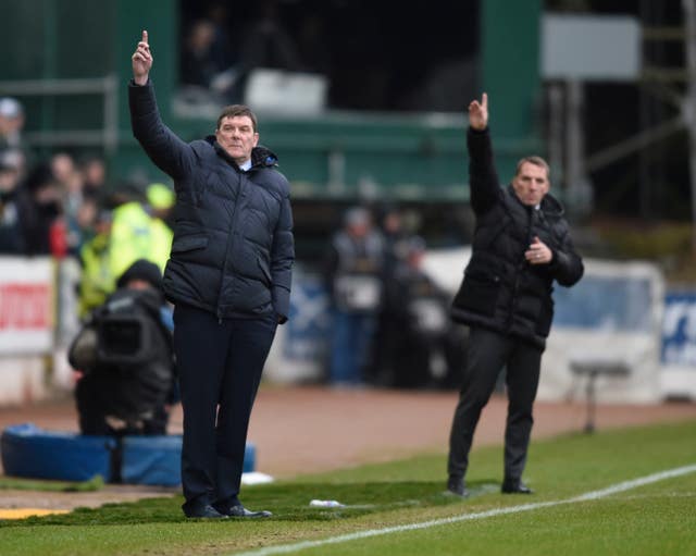 St Johnstone manager Tommy Wright and Celtic manager Brendan Rodgers gesture on the touchline