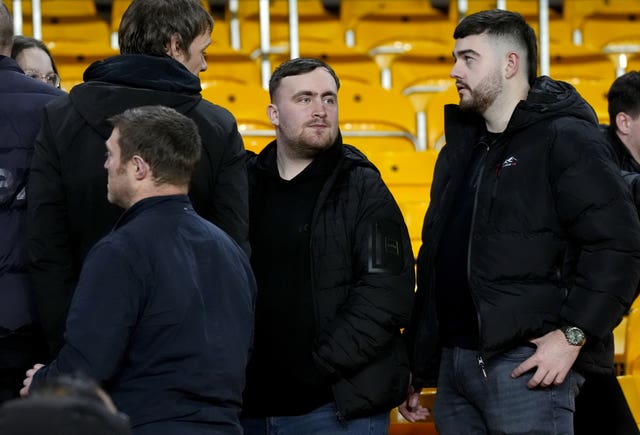 Luke Littler, centre, with friends at Wolves