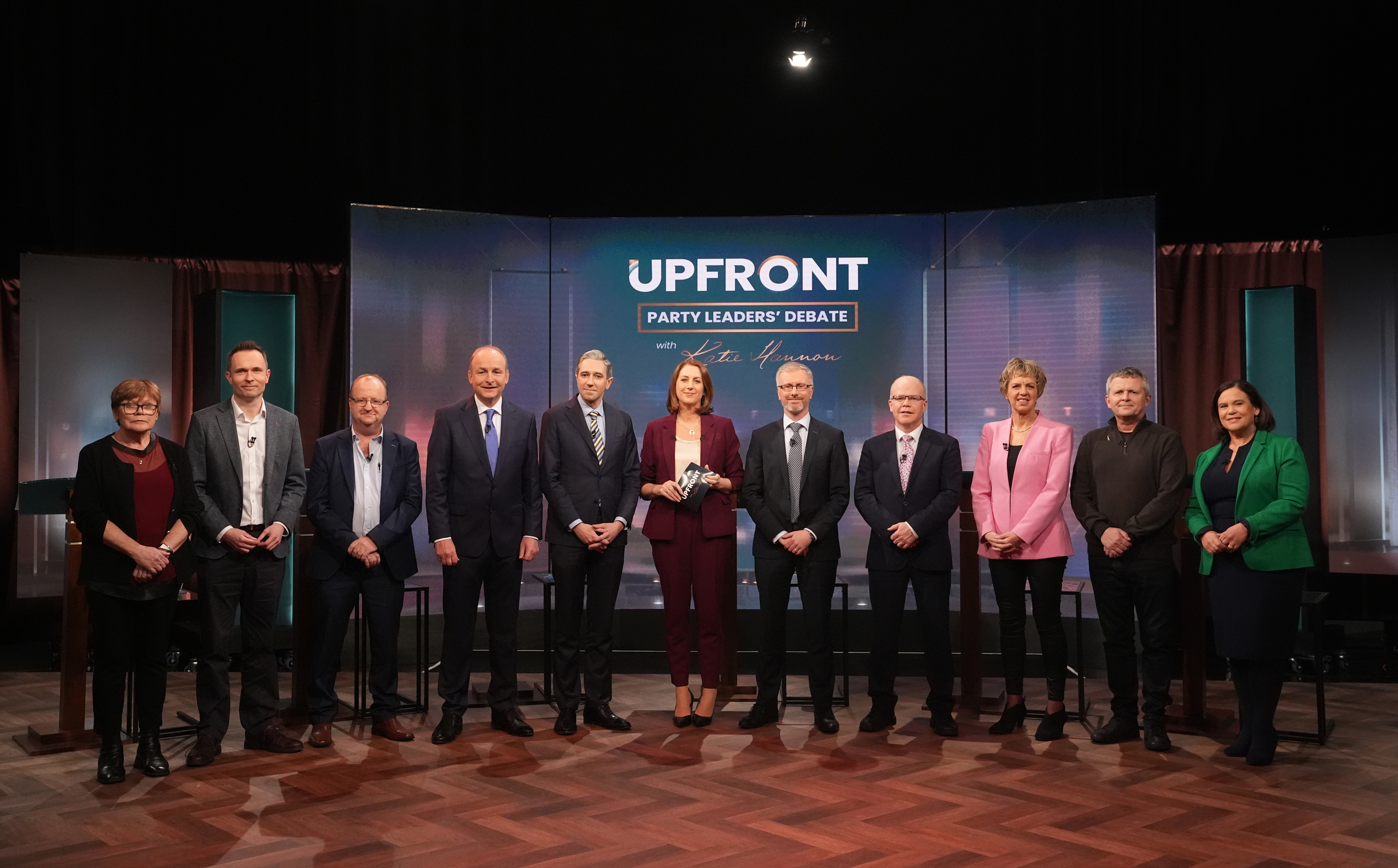 Party leaders standing next to each other in a TV studio