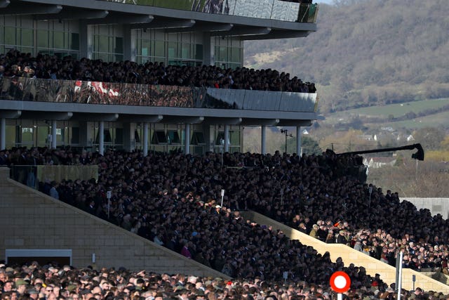 Crowds in the grandstand during Gold Cup day at Cheltenham