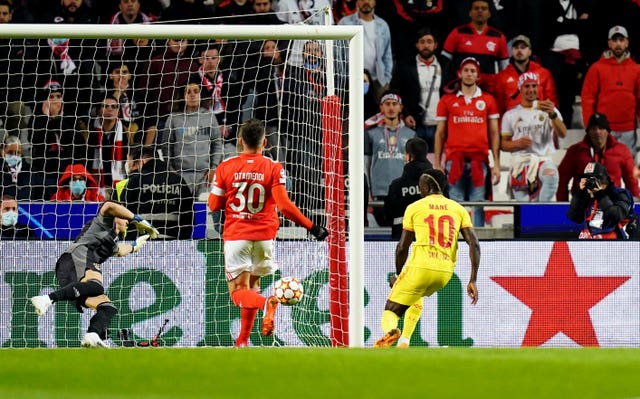 Sadio Mane, right, scores Liverpool’s second goal