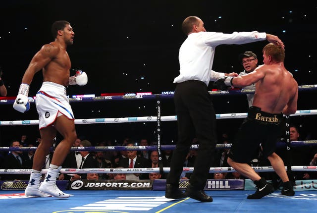 Anthony Joshua stepped it up in the seventh and knocked his opponent down