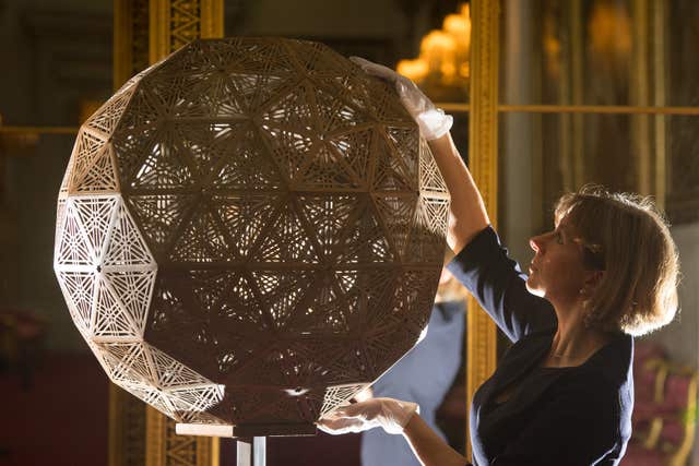  A walnut geodesic dome sculpture by Naseer Yasna (Dominic Lipinksi/PA)