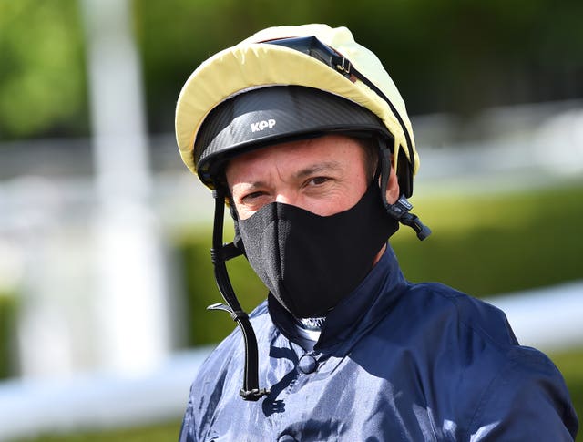 All jockeys are required to wear a mask while racing