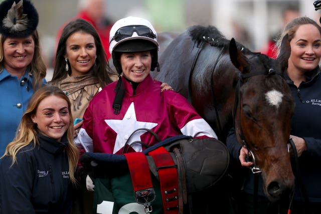 Jockey Lisa O’Neill and Tiger Roll celebrate winning the National Hunt Chase