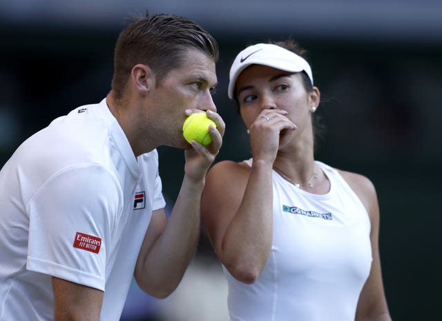 Desirae Krawczyk and Neal Skupski talk during the mixed doubles final
