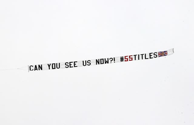 A plane flies over Dundee United's stadium with the message 'Can You See Us Now?'