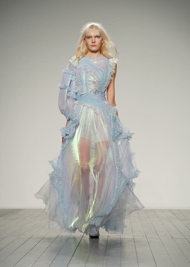 Models on the catwalk during the Bora Aksu Autumn/Winter 2019 London Fashion Week show at the Garden Museum, London.