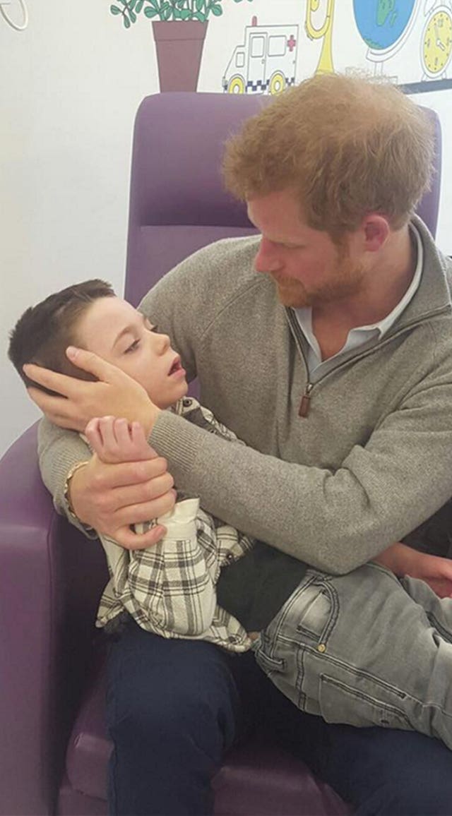 Prince Harry with Ollie Carroll