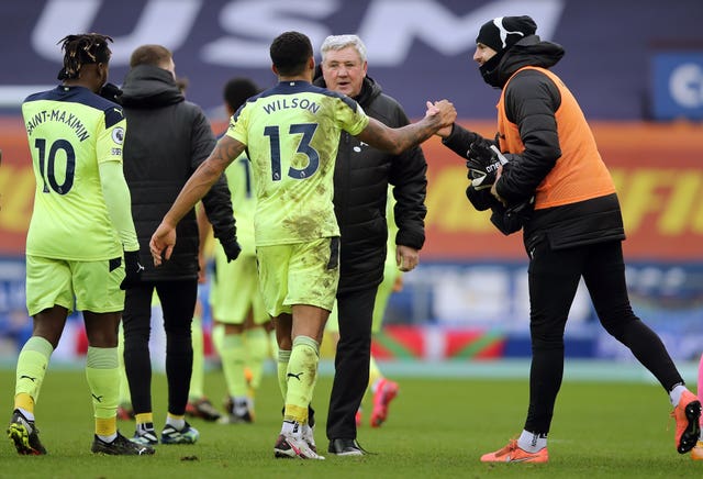 Newcastle manager Steve Bruce, centre, with goalscorer Callum Wilson 