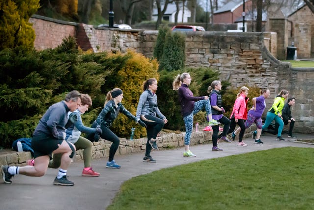 People taking part in a "Boot Camp" exercise class in Springhead Park, Rothwell, Leeds