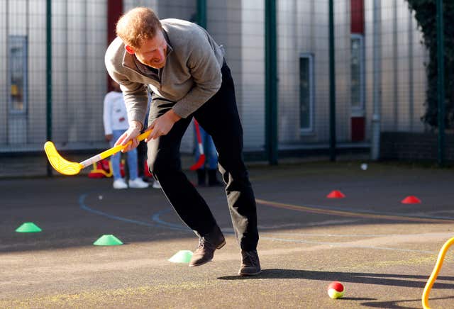 Prince Harry couldn't resist taking to the field