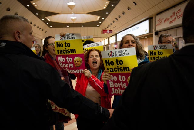 Protesters at the launch of the Conservative Party’s General Election campaign in Birmingham