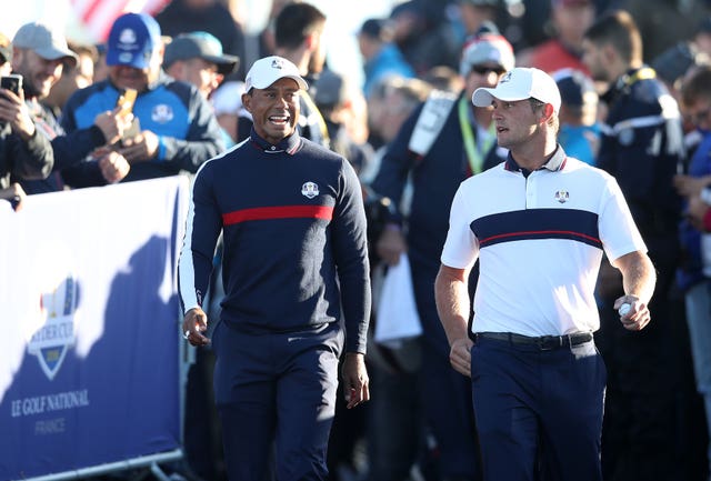 Tiger Woods, left, and Bryson DeChambeau