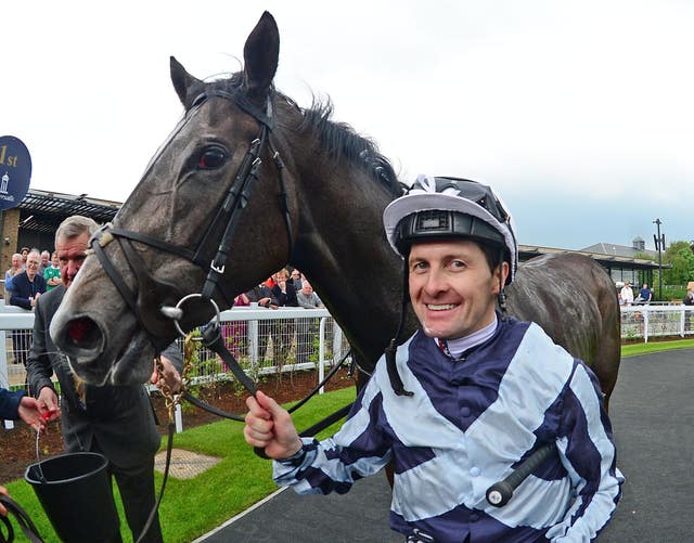 Colm O'Donoghue all smiles after the Irish Guineas