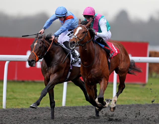 Crossed Baton in winning action on the all-weather