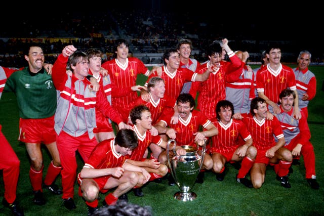 Kenny Dalglish, second from left, celebrates with team-mates after Liverpool win the 1984 European Cup final on penalties against Roma