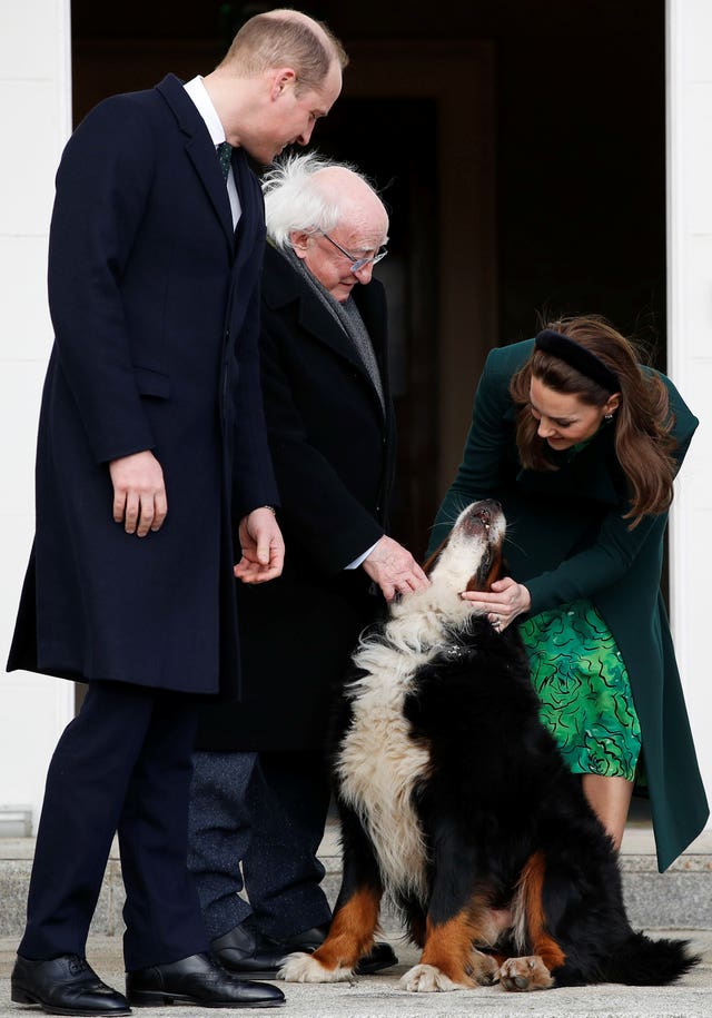 Kate and William with Michael D Higgins and the president’s dog, Brod, at Aras an Uachtarain in 2020
