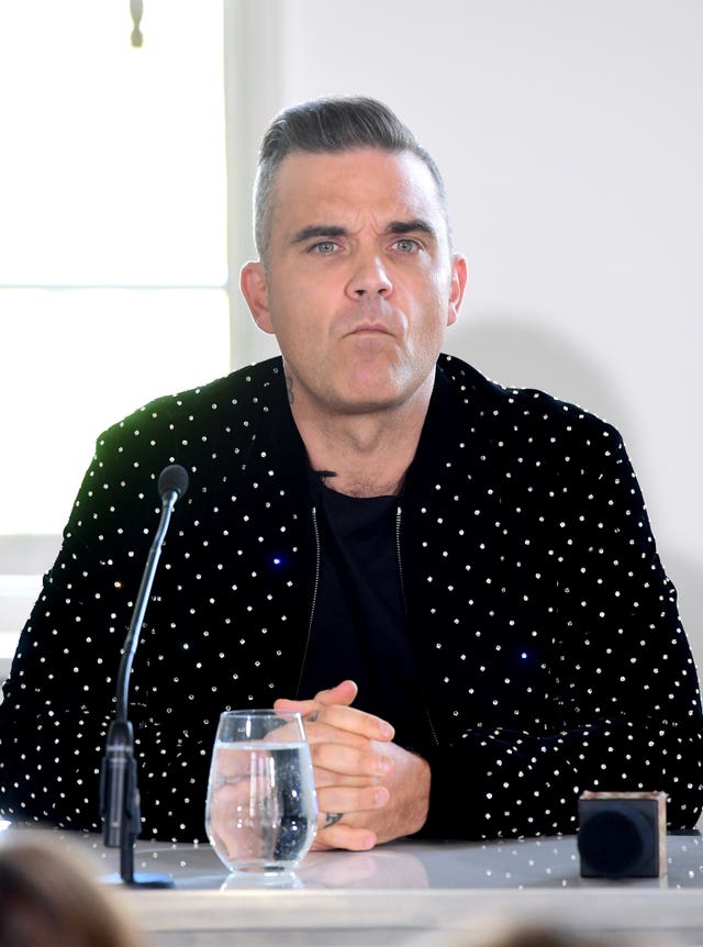 Robbie Williams is a judge on X Factor