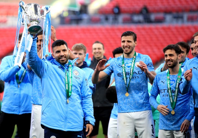 Manchester City's Sergio Aguero lifts the Carabao Cup trophy