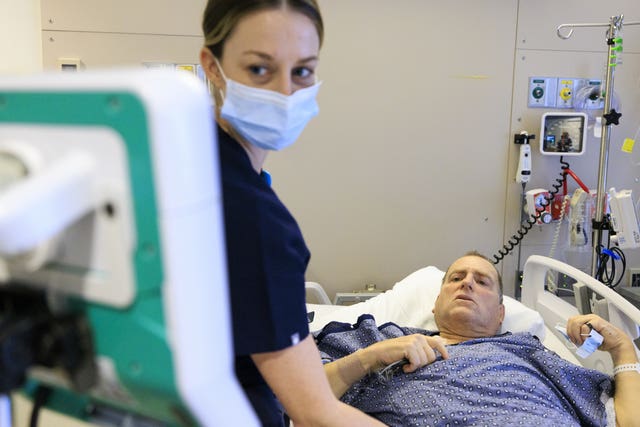 Patient watched by a nurse