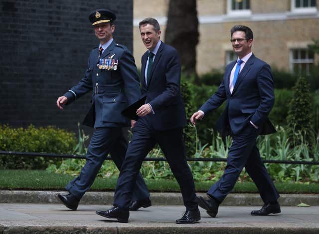 Defence Secretary Gavin Williamson (centre) arrives in Downing Street (Jonathan Brady/PA)