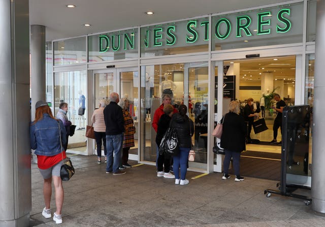 Shoppers queue