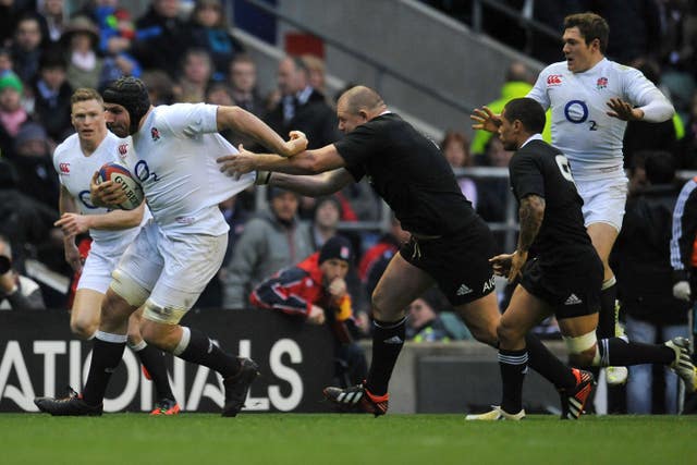 England's Ben Morgan runs with the ball