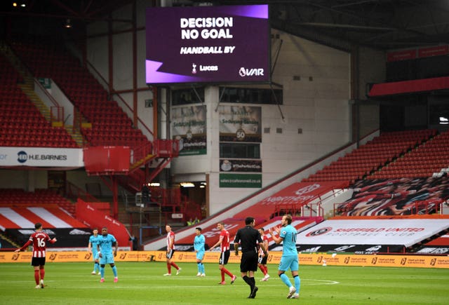 Kane complains to match referee Chris Kavanagh as his goal is ruled out by VAR