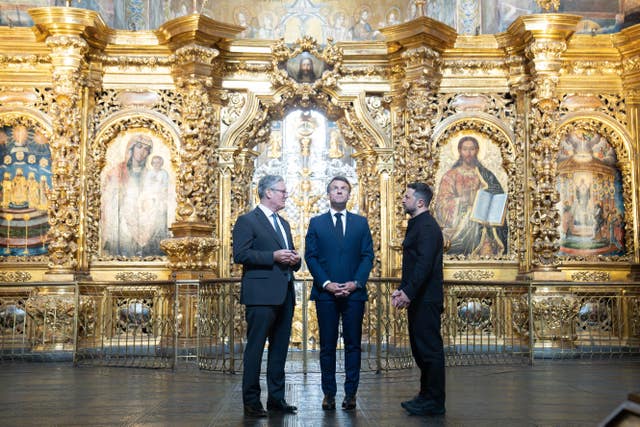 Sir Keir Starmer, French President Emmanuel Macron and Ukrainian President Volodymyr Zelensky visit St Sophia Cathedral in Kyiv