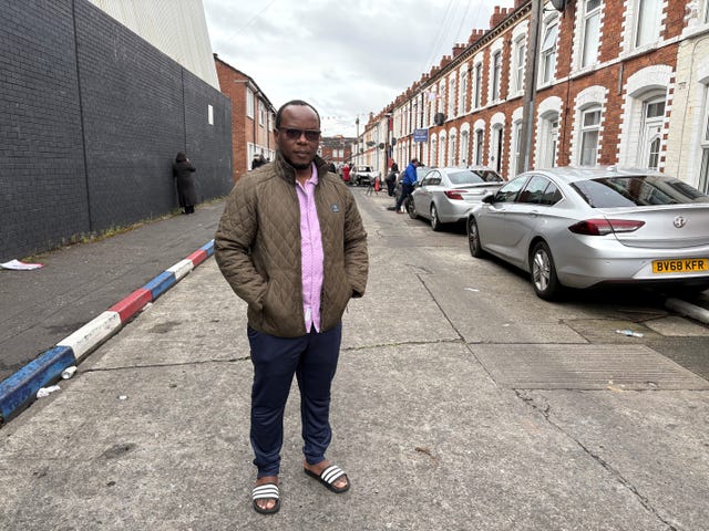 Anselme Shima standing on a street