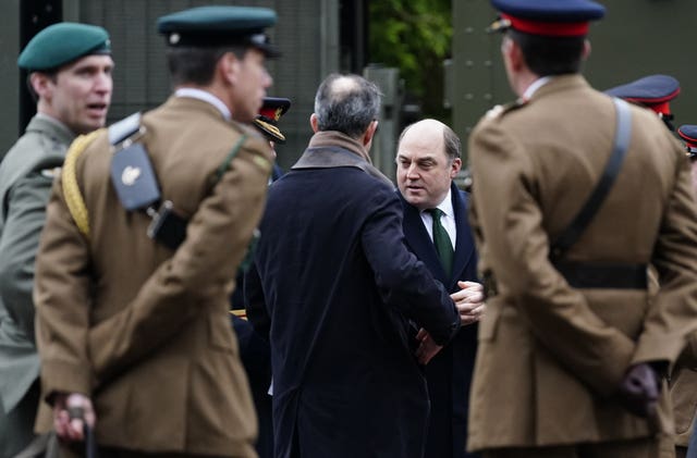 Defence Secretary Ben Wallace (2nd right) after the change of colours parade(Andrew Matthews/PA)