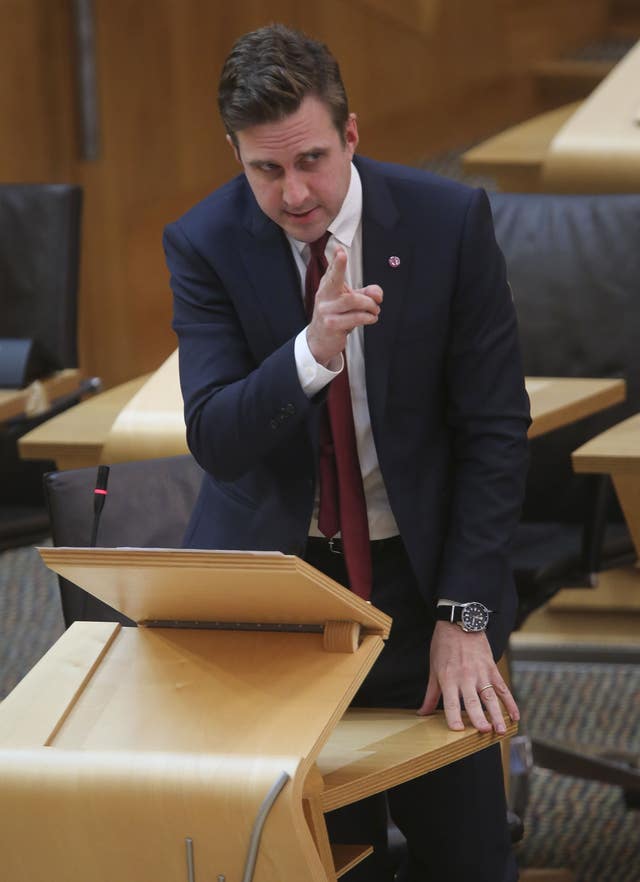 Daniel Johnson pointing while speaking in Holyrood