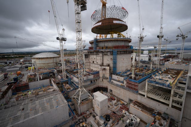 Big Carl, the world’s largest crane, was used to lift the dome into the second reactor at Hinkley Point C (Ben Birchall/PA)