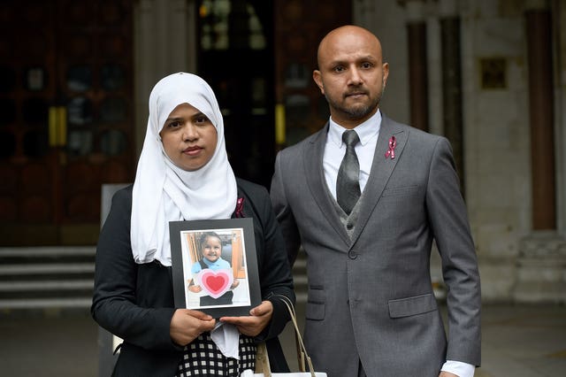 Tafida's parents Shelina Begum and Mohammed Raqeeb outside court