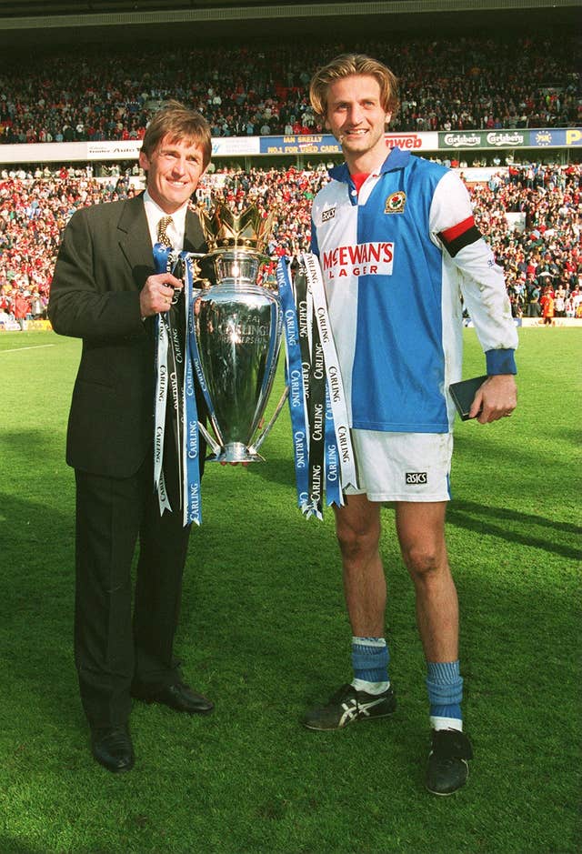 Dalglish, pictured with Tim Sherwood, became only the fourth manager to win the title with two different clubs after his Premier League success with Blackburn.