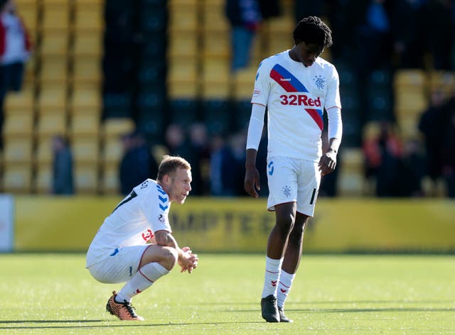 Scott Arfield (right) and Ovie Ejaria are dejected after defeat to Livingston