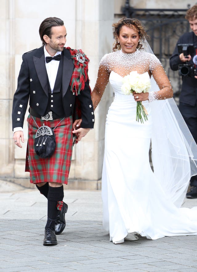 Spice Girl Melanie Brown, Mel B, and her husband hairdresser Rory McPhee leave St Paul’s Cathedral, London, following their wedding
