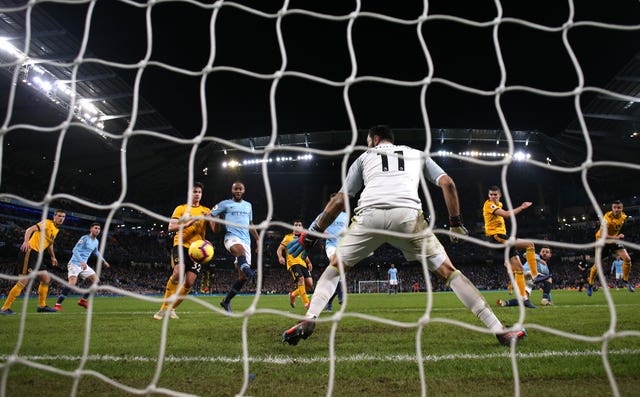 Wolves’ Conor Coady (third right) scores an own goal