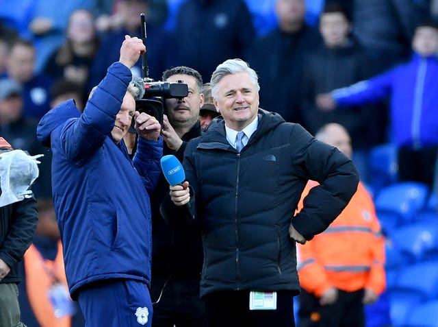 Neil Warnock, left, acknowledges the crowd after the final whistle 