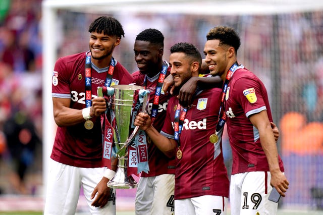 Mings (far left), was a key player in Aston Villa's 2018-19 return to the Premier League