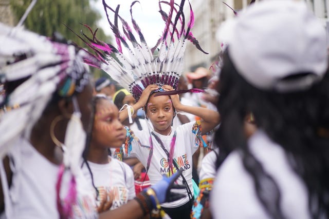 Performers during the children’s parade on Family Day at the Notting Hill Carnival in London