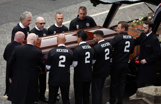 Pallbearer's including former Rangers players Michael Mols, Nacho Novo and Thomas Buffel carry the coffin of Fernando Ricksen