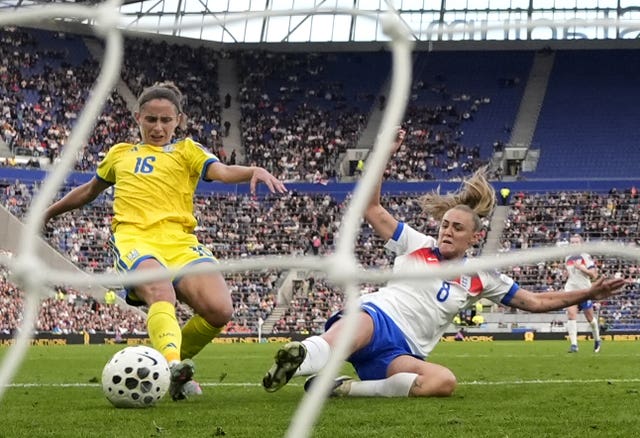 Georgia Stanway slides in to score England’s second goal against Ukraine