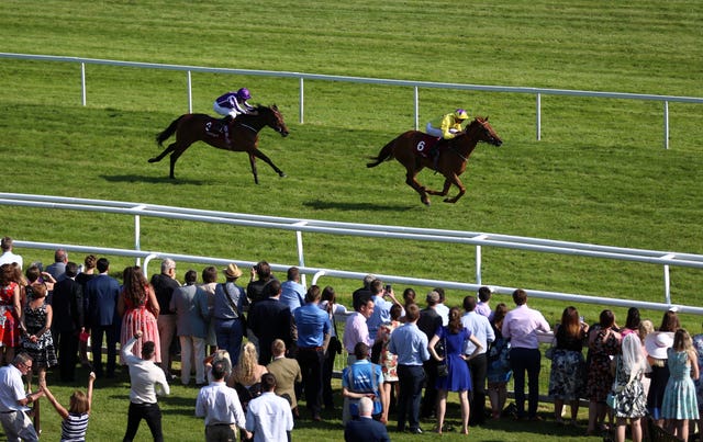 Sea of Class beats Athena at Newbury, who has since come out and won a Grade One