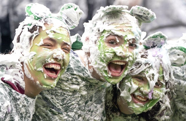 Hundreds of students take part in the traditional Raisin Monday foam fight on St Salvator’s Lower College Lawn at the University of St Andrews in Fife