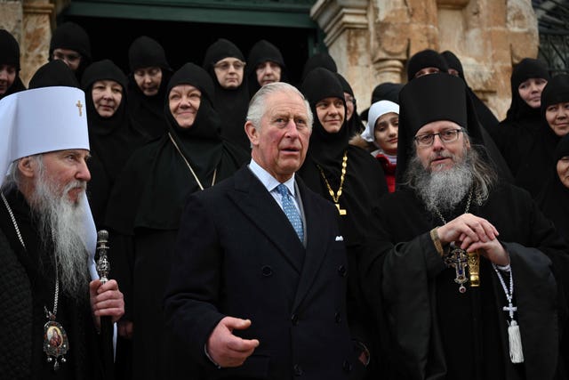 Charles during a visit to the Church of Mary Magdalene 